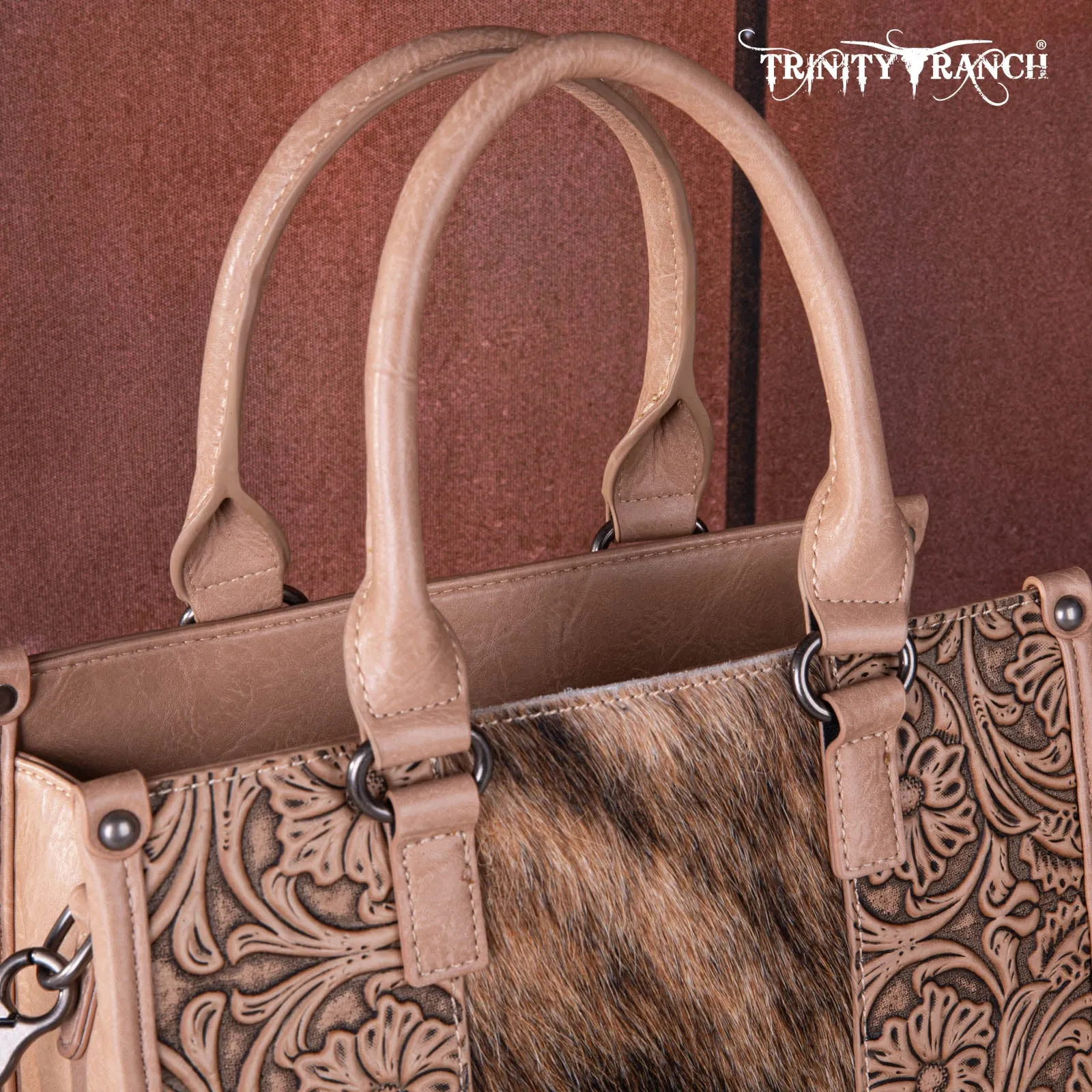 TR164-8250  Trinity Ranch Hair On Cowhide Tooling Concealed Carry Tote/Crossbody