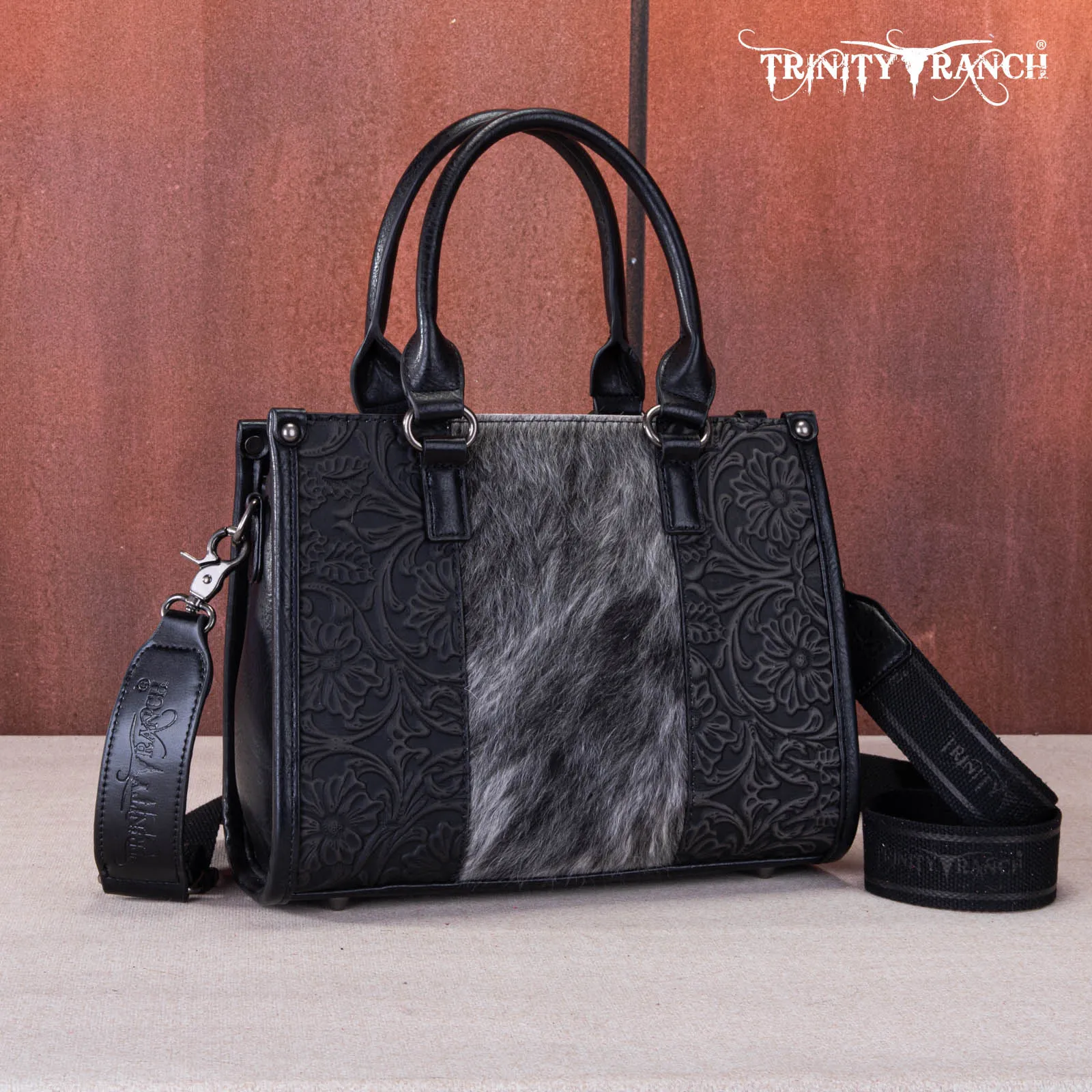 TR164-8250  Trinity Ranch Hair On Cowhide Tooling Concealed Carry Tote/Crossbody