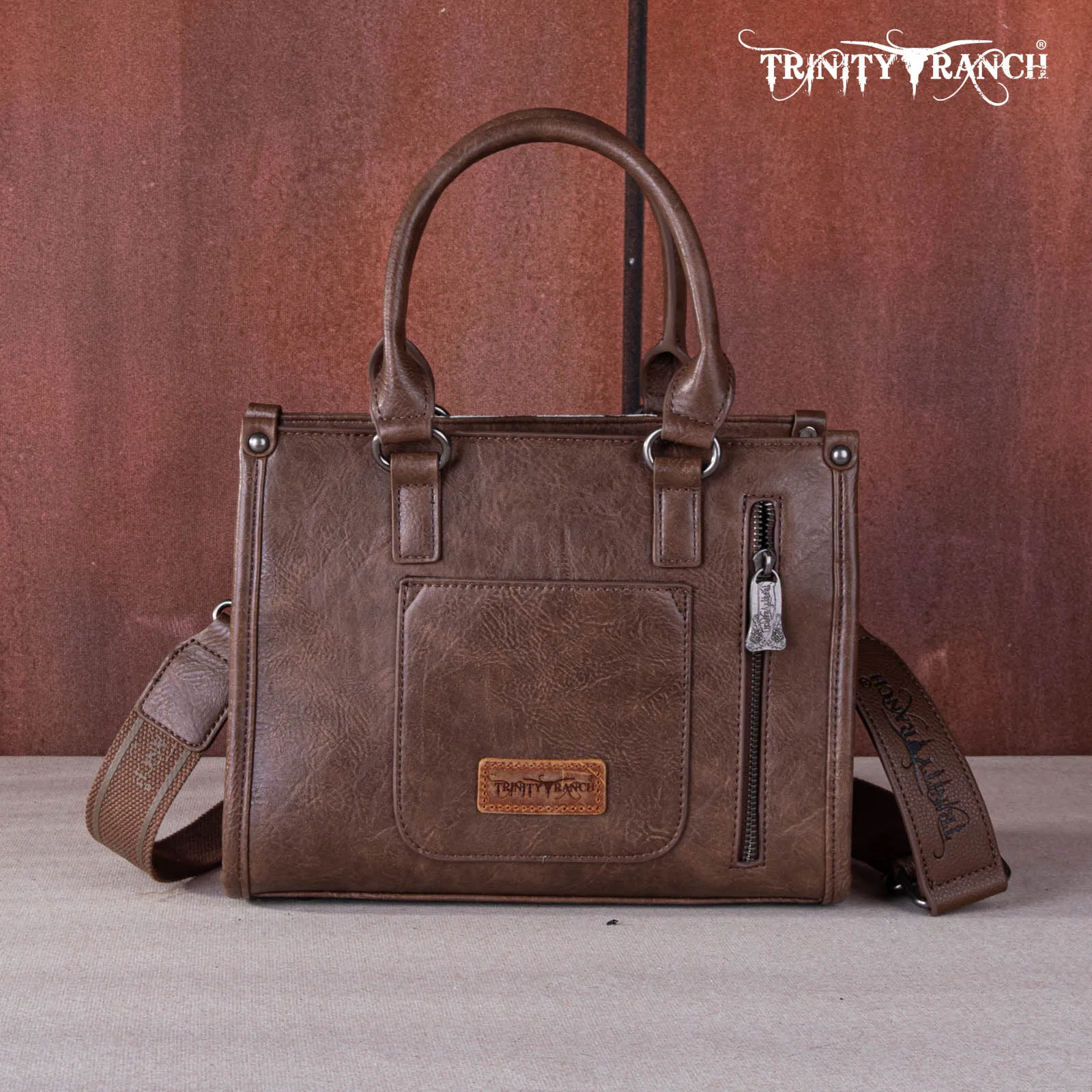 TR164-8250  Trinity Ranch Hair On Cowhide Tooling Concealed Carry Tote/Crossbody