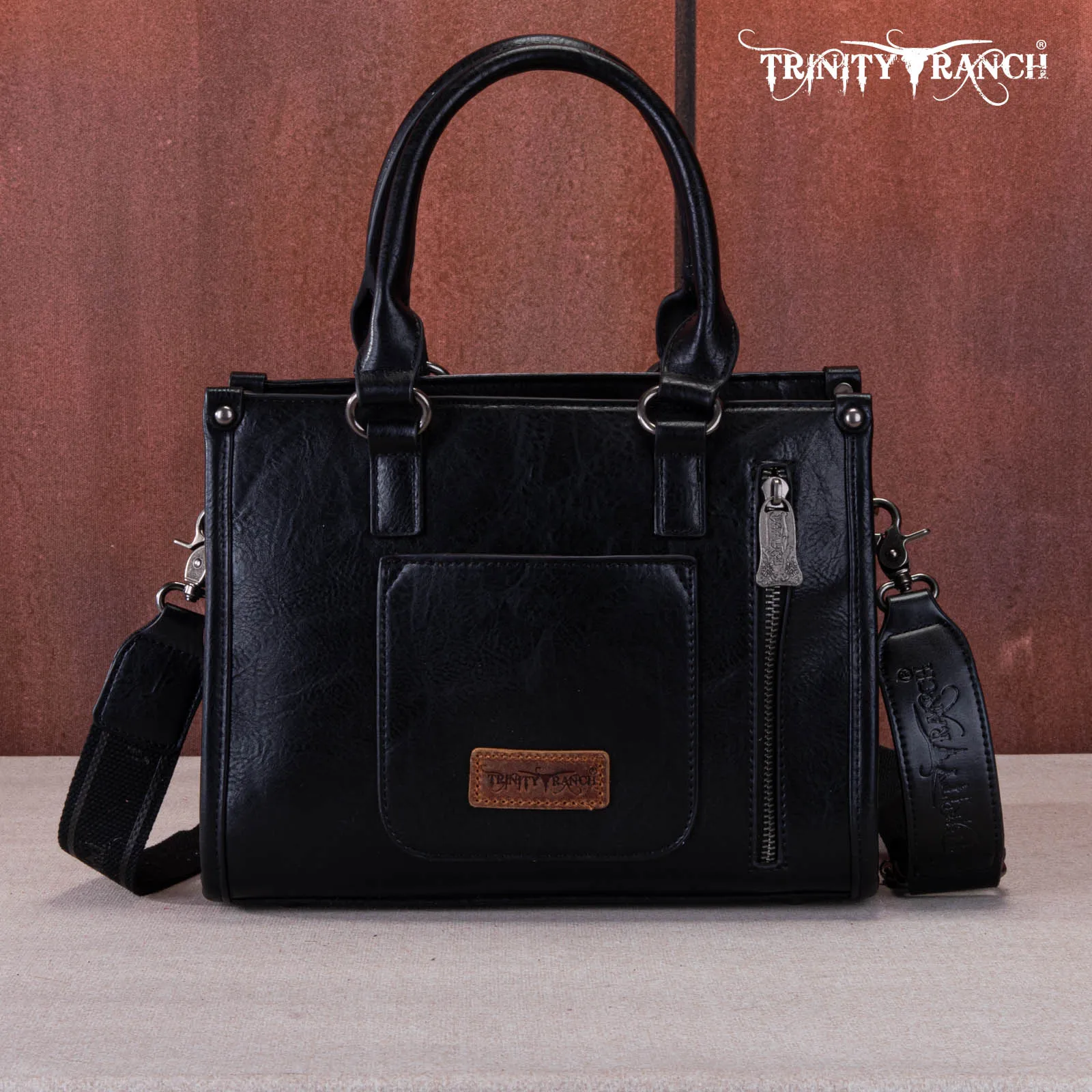 TR164-8250  Trinity Ranch Hair On Cowhide Tooling Concealed Carry Tote/Crossbody