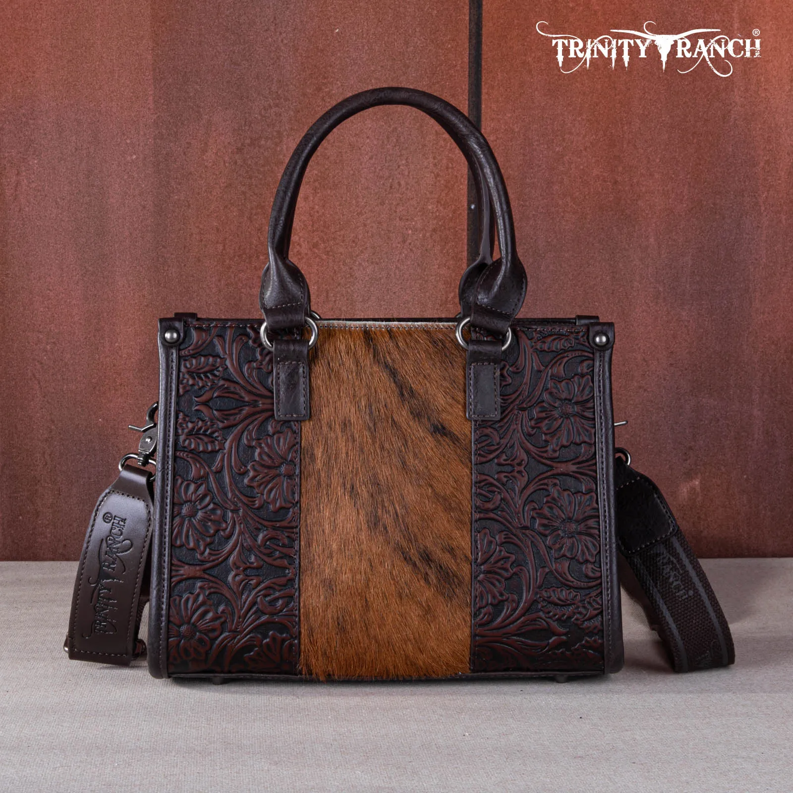 TR164-8250  Trinity Ranch Hair On Cowhide Tooling Concealed Carry Tote/Crossbody