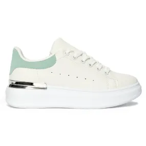 White women's sneakers with a green element